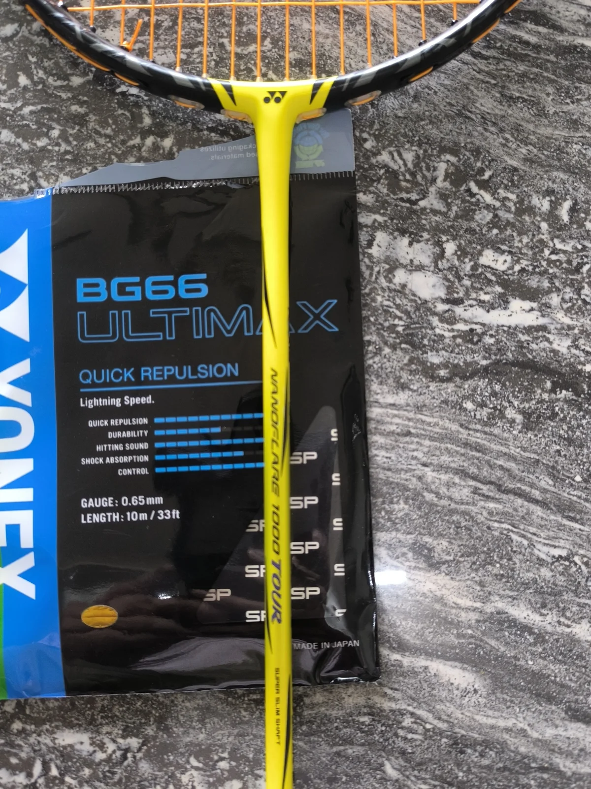 Close-up of customised string bed and tension information on Yonex Nanoflare 1000 Tour